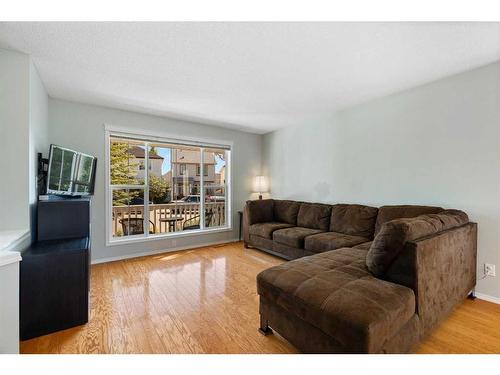 63 Tuscany Springs Rise Nw, Calgary, AB - Indoor Photo Showing Living Room