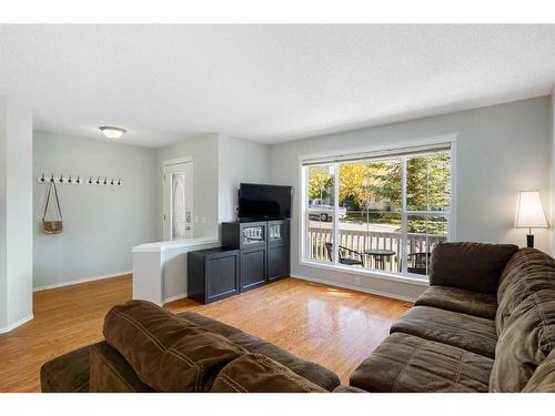 63 Tuscany Springs Rise Nw, Calgary, AB - Indoor Photo Showing Living Room