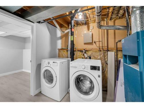 63 Falton Close Ne, Calgary, AB - Indoor Photo Showing Laundry Room