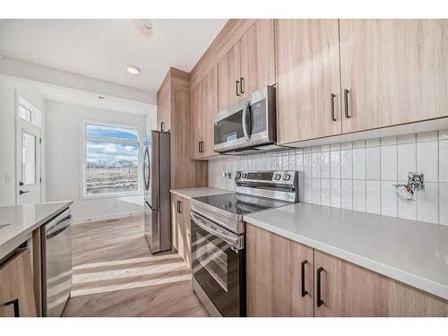 1094 Cobblestone Boulevard, Airdrie, AB - Indoor Photo Showing Kitchen