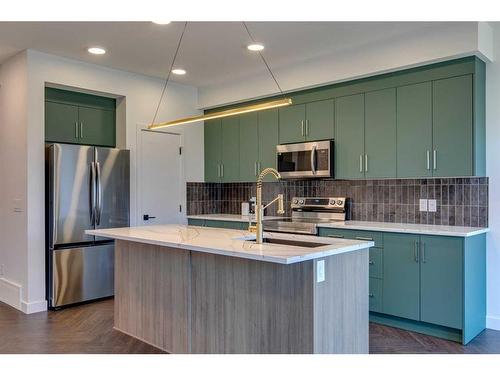 36 Clydesdale Court, Cochrane, AB - Indoor Photo Showing Kitchen