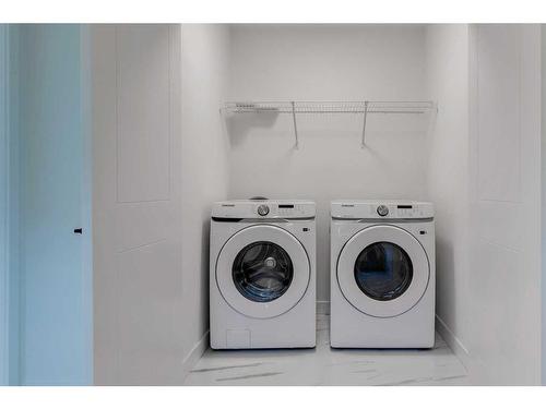 40 Clydesdale Court, Cochrane, AB - Indoor Photo Showing Laundry Room