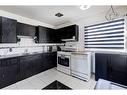 10 Stanley Place Sw, Calgary, AB  - Indoor Photo Showing Kitchen 