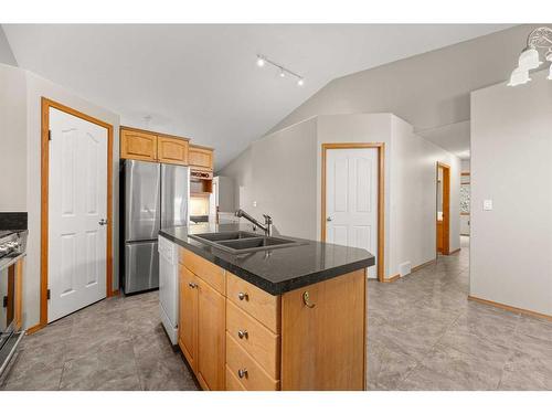 2109 22 Avenue, Didsbury, AB - Indoor Photo Showing Kitchen With Double Sink