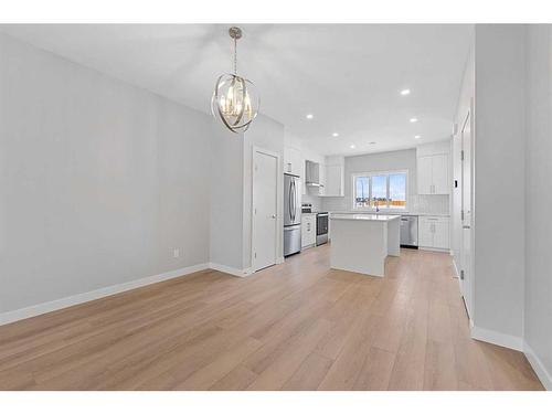 52 Ricardo Ranch Avenue Se, Calgary, AB - Indoor Photo Showing Kitchen With Upgraded Kitchen