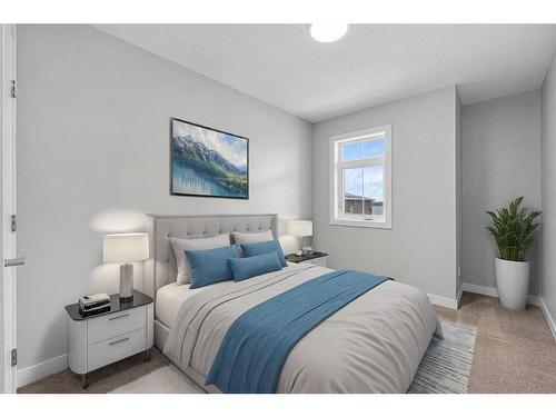 52 Ricardo Ranch Avenue Se, Calgary, AB - Indoor Photo Showing Bedroom