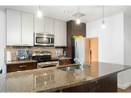 2103-220 12 Avenue Se, Calgary, AB - Indoor Photo Showing Kitchen With Stainless Steel Kitchen With Double Sink With Upgraded Kitchen