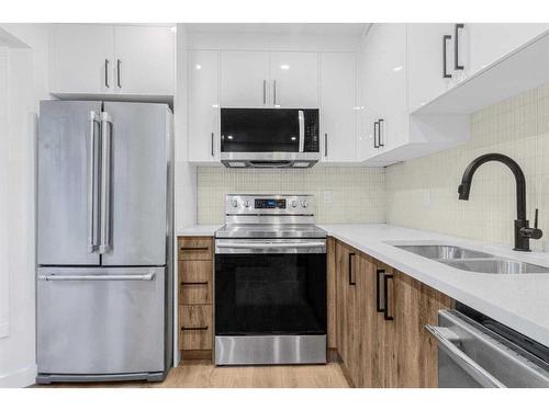 259 Whitehill Place Ne, Calgary, AB - Indoor Photo Showing Kitchen With Double Sink With Upgraded Kitchen