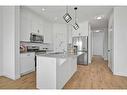 305 Ambleton Drive Nw, Calgary, AB  - Indoor Photo Showing Kitchen With Stainless Steel Kitchen With Upgraded Kitchen 