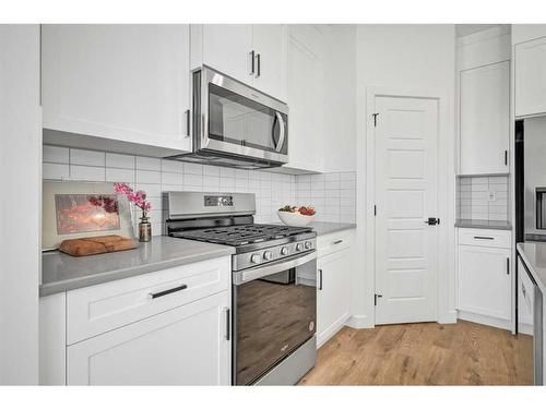 305 Ambleton Drive Nw, Calgary, AB - Indoor Photo Showing Kitchen With Upgraded Kitchen