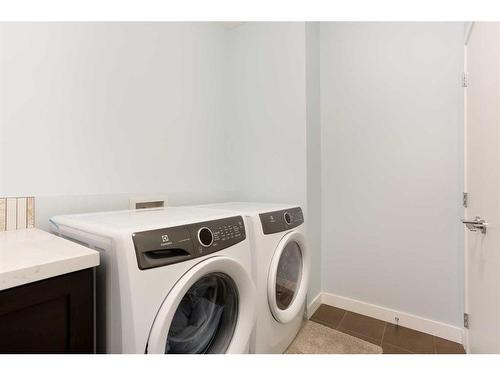 14 Copperstone Drive Se, Calgary, AB - Indoor Photo Showing Laundry Room