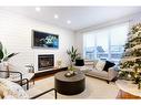 14 Copperstone Drive Se, Calgary, AB  - Indoor Photo Showing Living Room With Fireplace 