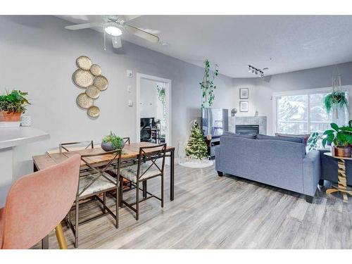 202-126 14 Avenue Sw, Calgary, AB - Indoor Photo Showing Living Room With Fireplace