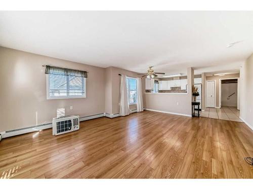 401-5000 Somervale Court Sw, Calgary, AB - Indoor Photo Showing Living Room