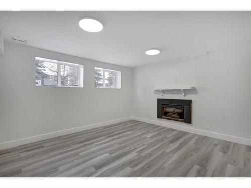 435 Queensland Road Se, Calgary, AB - Indoor With Fireplace