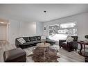 435 Queensland Road Se, Calgary, AB  - Indoor Photo Showing Living Room 