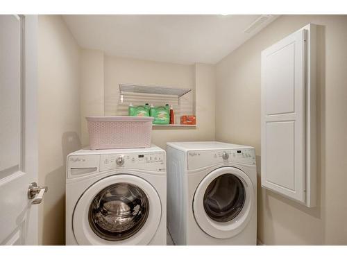 48 Auburn Meadows Boulevard Se, Calgary, AB - Indoor Photo Showing Laundry Room