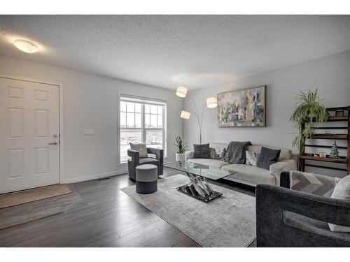 48 Auburn Meadows Boulevard Se, Calgary, AB - Indoor Photo Showing Living Room