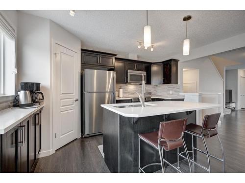 48 Auburn Meadows Boulevard Se, Calgary, AB - Indoor Photo Showing Kitchen With Stainless Steel Kitchen With Double Sink With Upgraded Kitchen