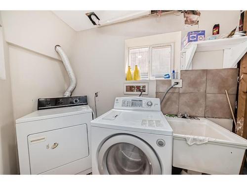 176 Laguna Close Ne, Calgary, AB - Indoor Photo Showing Laundry Room