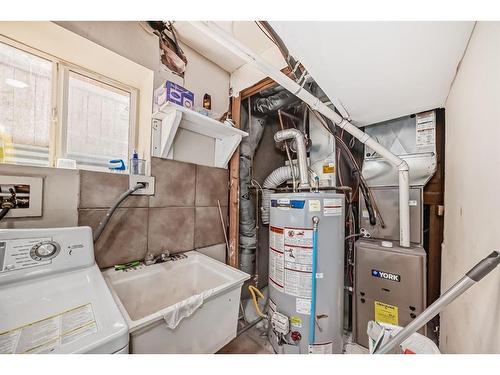 176 Laguna Close Ne, Calgary, AB - Indoor Photo Showing Laundry Room