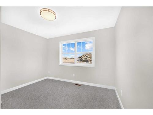 70 Sandpiper Bend, Chestermere, AB - Indoor Photo Showing Other Room