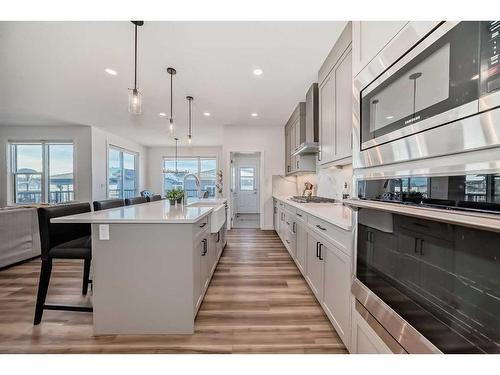 713 Grayling Link, Rural Rocky View County, AB - Indoor Photo Showing Kitchen With Upgraded Kitchen