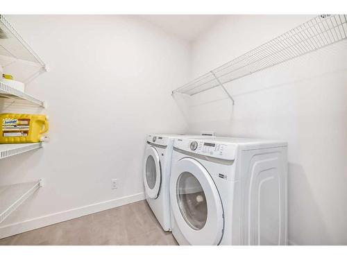 713 Grayling Link, Rural Rocky View County, AB - Indoor Photo Showing Laundry Room