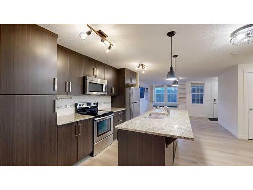 218 Mackenzie Towne Close Close Se, Calgary, AB - Indoor Photo Showing Kitchen