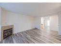 36-111 Tarawood Lane Ne, Calgary, AB  - Indoor Photo Showing Living Room With Fireplace 