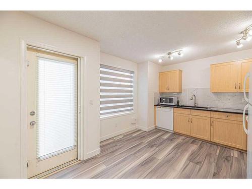 36-111 Tarawood Lane Ne, Calgary, AB - Indoor Photo Showing Kitchen