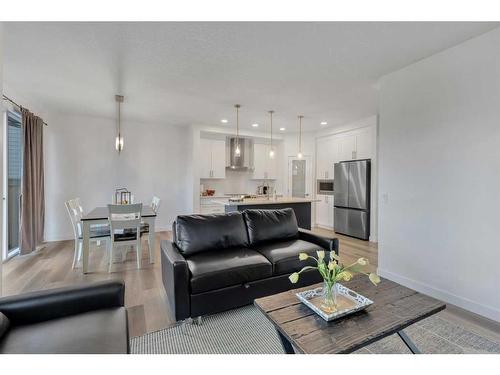 312 Heartland Way, Cochrane, AB - Indoor Photo Showing Living Room