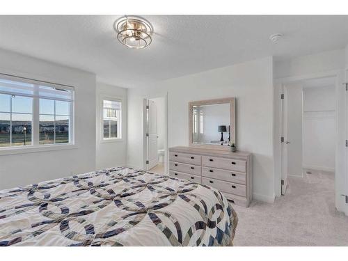 312 Heartland Way, Cochrane, AB - Indoor Photo Showing Bedroom