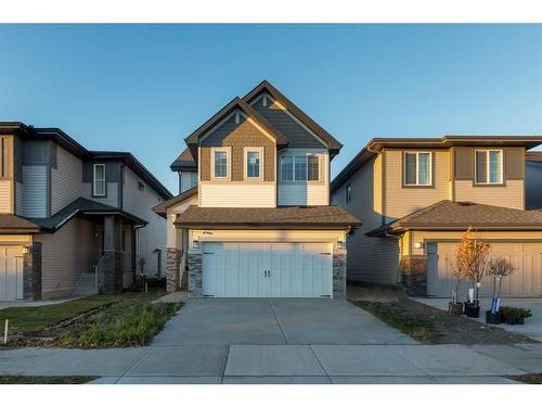 312 Heartland Way, Cochrane, AB - Outdoor With Facade