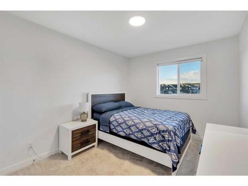 312 Heartland Way, Cochrane, AB - Indoor Photo Showing Bedroom