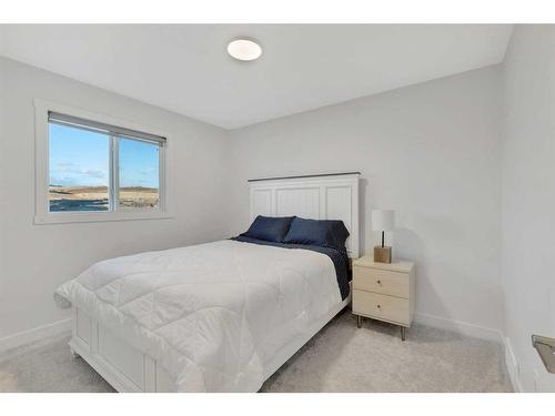 312 Heartland Way, Cochrane, AB - Indoor Photo Showing Bedroom