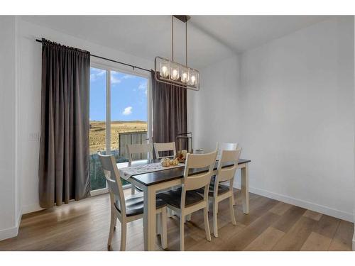 312 Heartland Way, Cochrane, AB - Indoor Photo Showing Dining Room