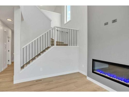 181 Waterford Way, Chestermere, AB - Indoor With Fireplace