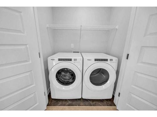 181 Waterford Way, Chestermere, AB - Indoor Photo Showing Laundry Room