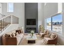 181 Waterford Way, Chestermere, AB  - Indoor Photo Showing Living Room With Fireplace 