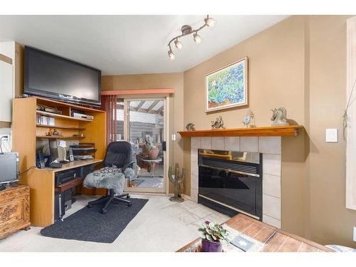 2219 Westmount Road Nw, Calgary, AB - Indoor With Fireplace