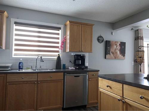 49 Royal Elm Mews Nw, Calgary, AB - Indoor Photo Showing Kitchen With Double Sink