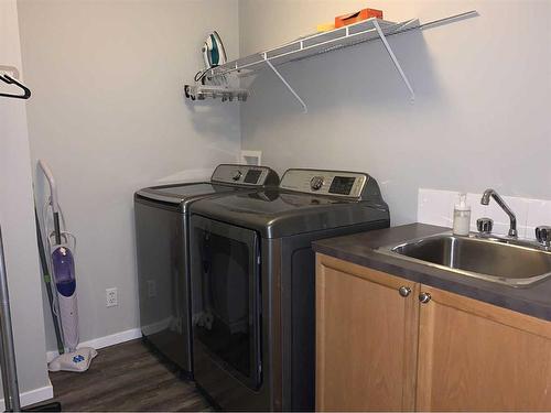 49 Royal Elm Mews Nw, Calgary, AB - Indoor Photo Showing Laundry Room