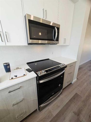 105-340 Ambleton Street Nw, Calgary, AB - Indoor Photo Showing Kitchen