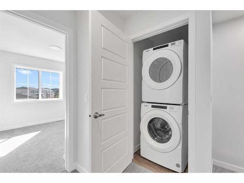 105-340 Ambleton Street Nw, Calgary, AB - Indoor Photo Showing Laundry Room