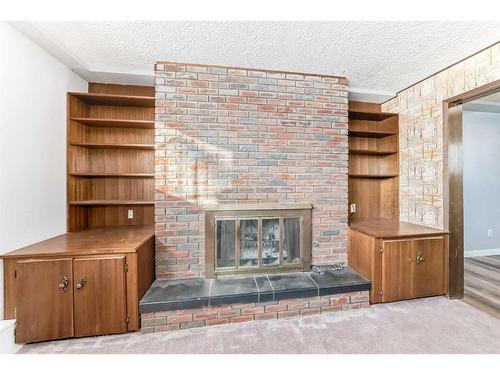 36 Anders Close, Red Deer, AB - Indoor With Fireplace