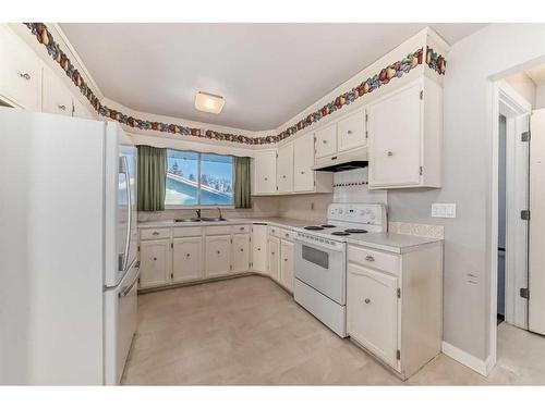 36 Anders Close, Red Deer, AB - Indoor Photo Showing Kitchen With Double Sink