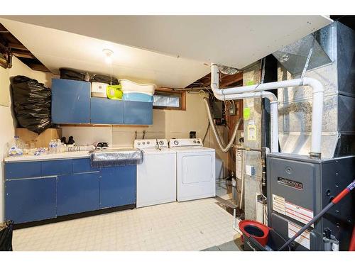 1323 Marlyn Way Ne, Calgary, AB - Indoor Photo Showing Laundry Room