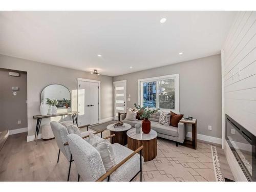 519 6 Street Ne, Calgary, AB - Indoor Photo Showing Living Room With Fireplace