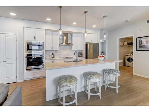 2109-42 Cranbrook Gardens Se, Calgary, AB - Indoor Photo Showing Kitchen With Upgraded Kitchen